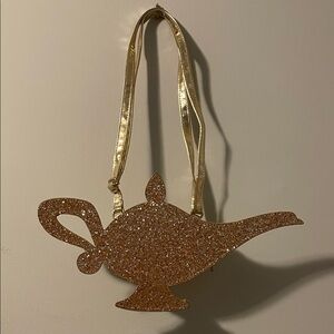 Disney Aladdin gold genie lamp purse. clean, no flaws.